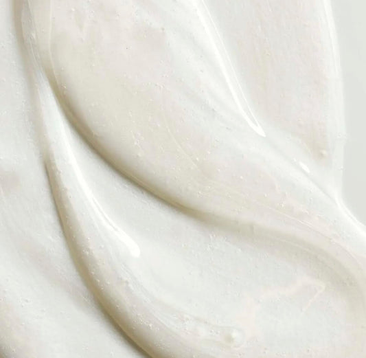 Yves Rocher shampoo jojoba oil texture close-up showing lightweight hydration for hair.