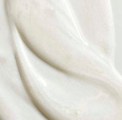 Yves Rocher shampoo jojoba oil texture close-up showing lightweight hydration for hair.