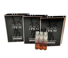 YSL Black Opium bottle mini spray sample for travel testing.