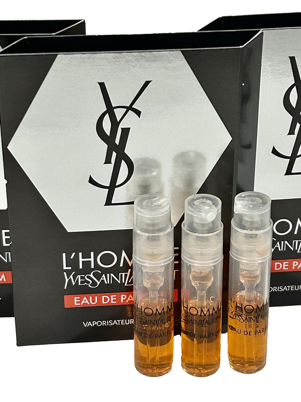 YSL L'Homme EDP trial-size vials provide compact fragrance testing for home or travel.