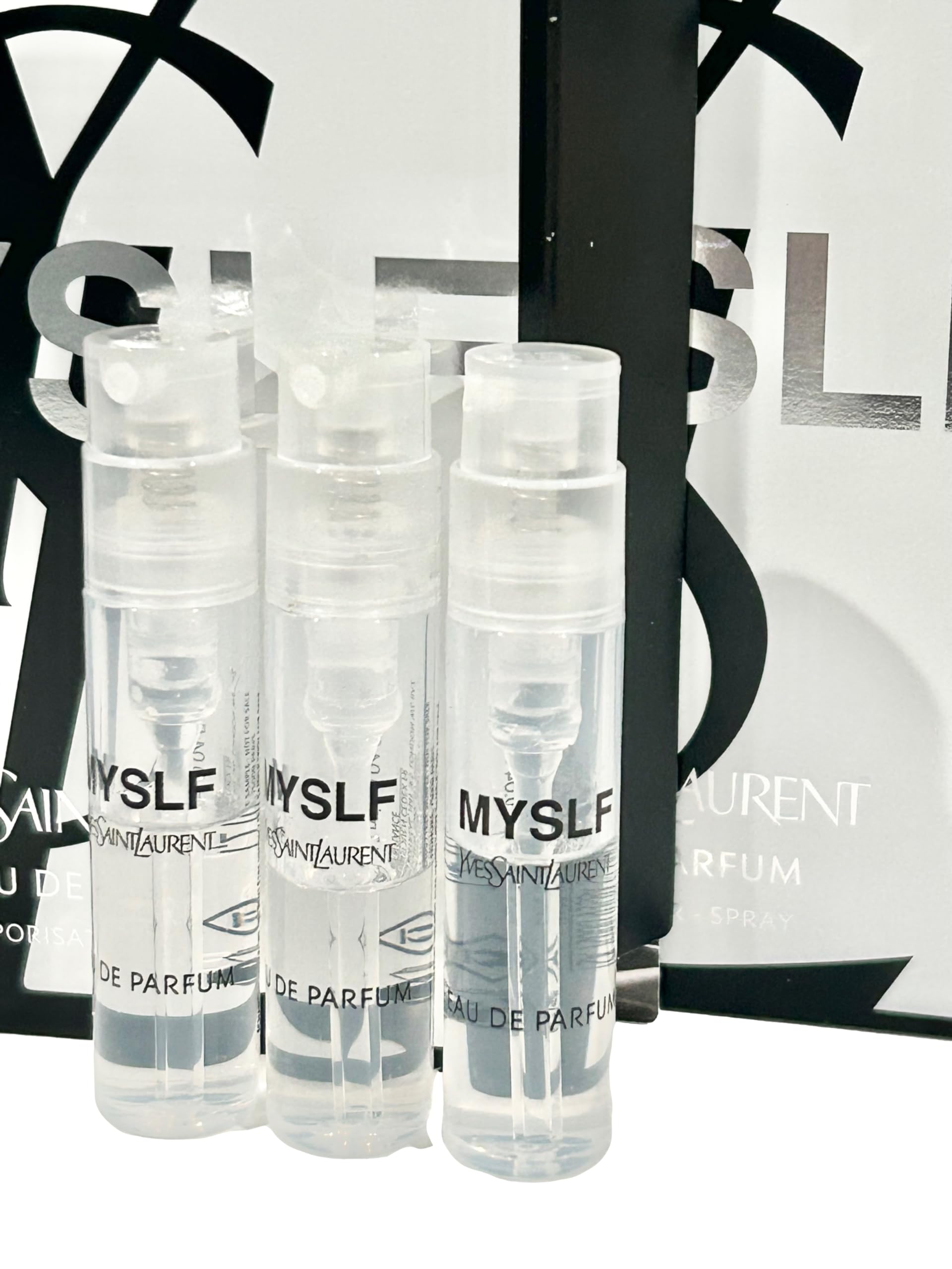 Travel-size YSL MYSLF spray vial shown as a portable fragrance option