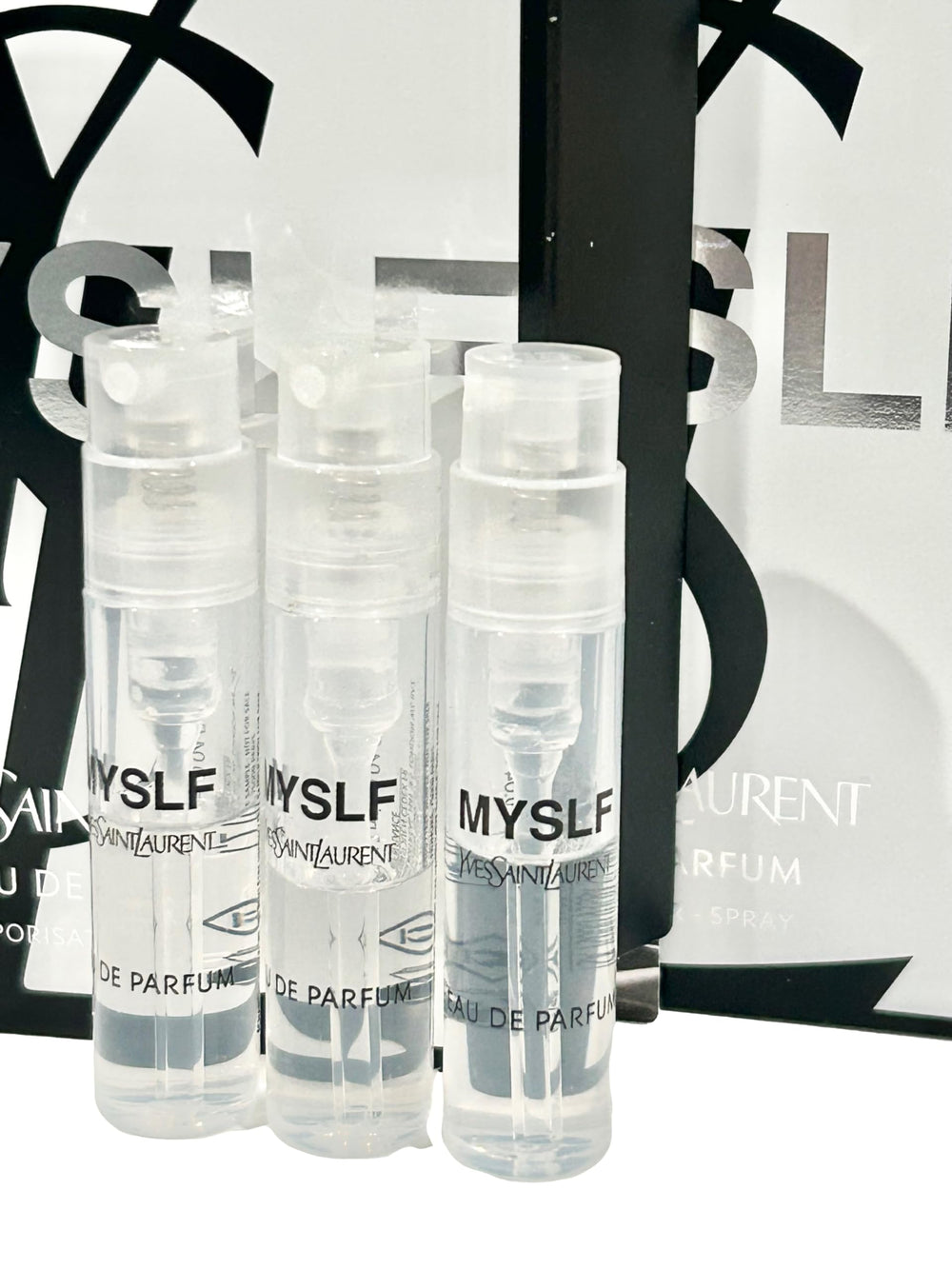 Travel-size YSL MYSLF spray vial shown as a portable fragrance option