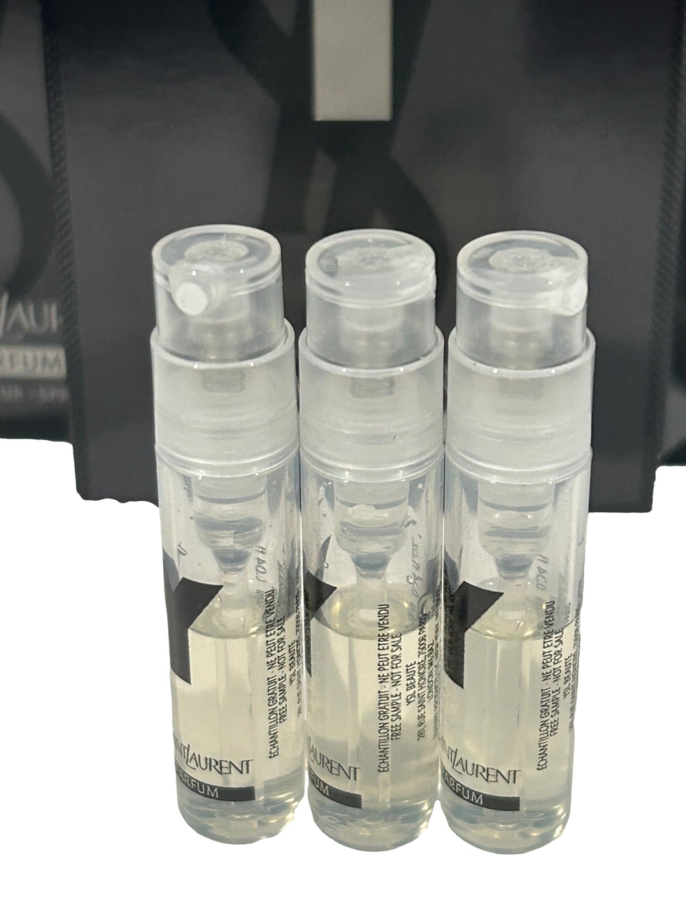 Travel-ready LE PARFUM trio, ideal in pockets, bags, or briefcase.