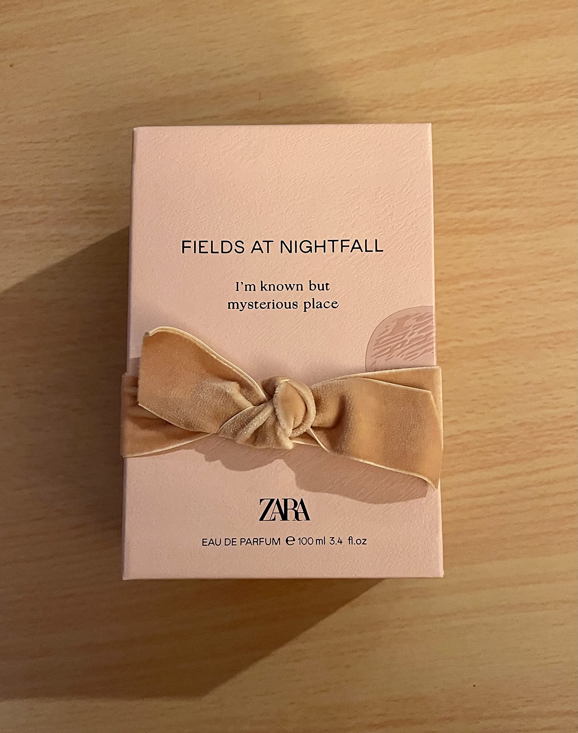 ZARA Fields at Nightfall bottle front view, inviting warm woody-floral aroma ideal for evening wear.