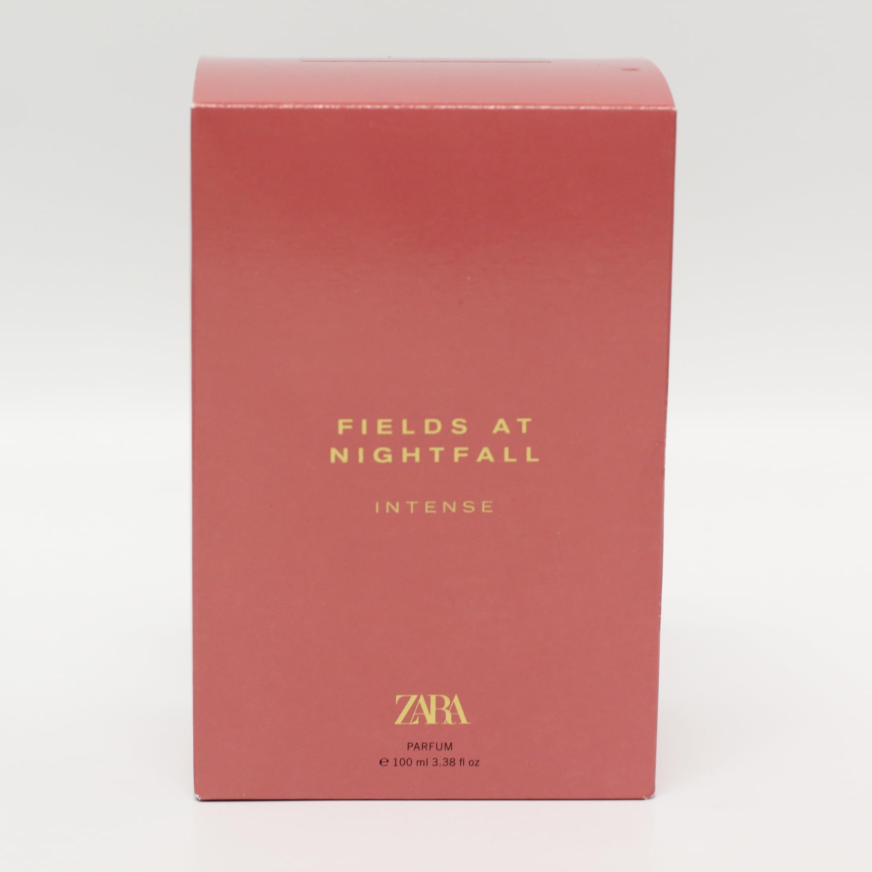 Zara Fields At Nightfall Intense front bottle beside gift box suggests elegant evening gifting