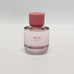 Zara Orchid close-up shows rose and lily petals with fruity accents.