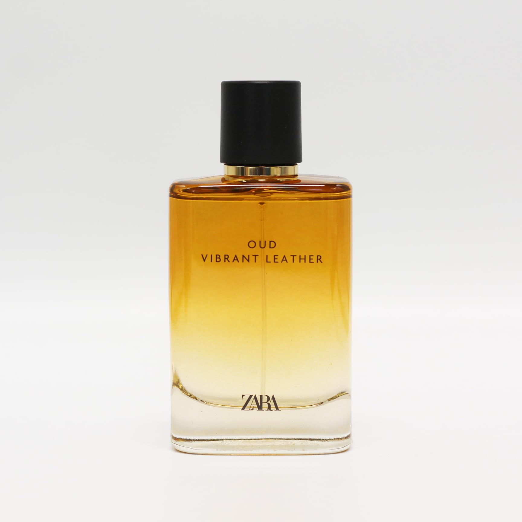 Zara Oud Vibrant Leather bottle closeup highlighting rich oud and leather notes for a signature scent.