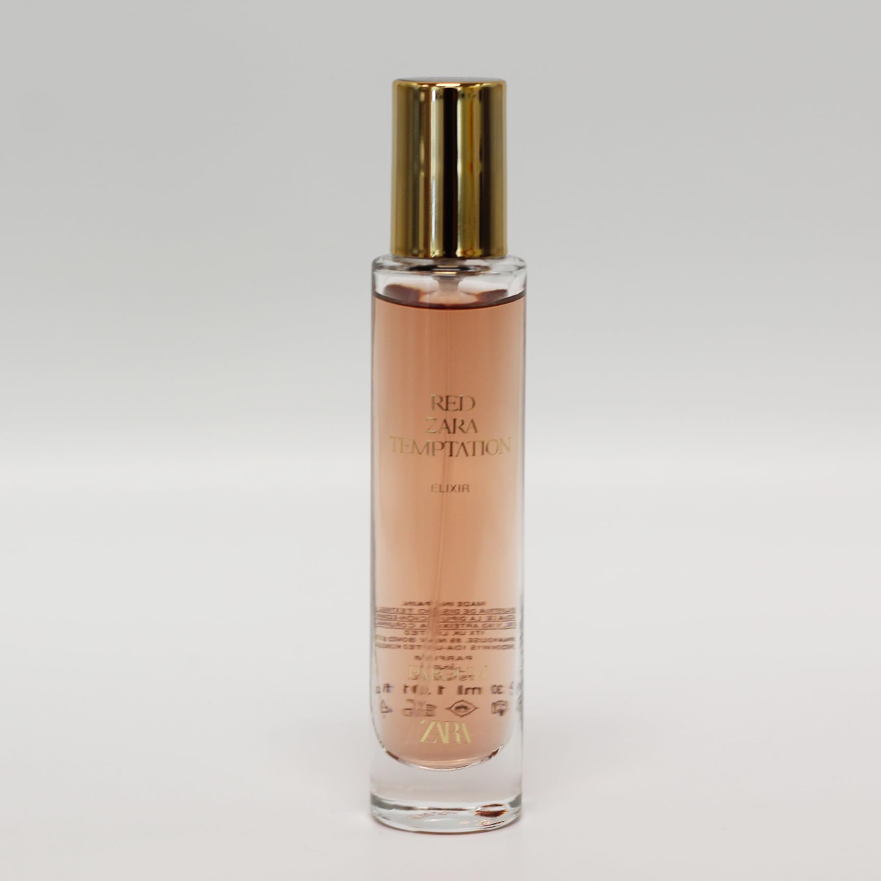 Zara Red Temptation Elixir top-sprayer for elegant, spill-free application.
