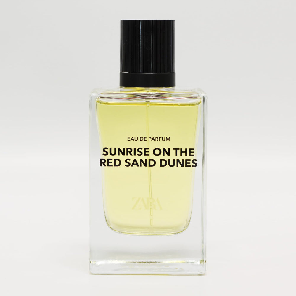 Zara Sunrise desert backdrop emphasizes energetic citrus opening