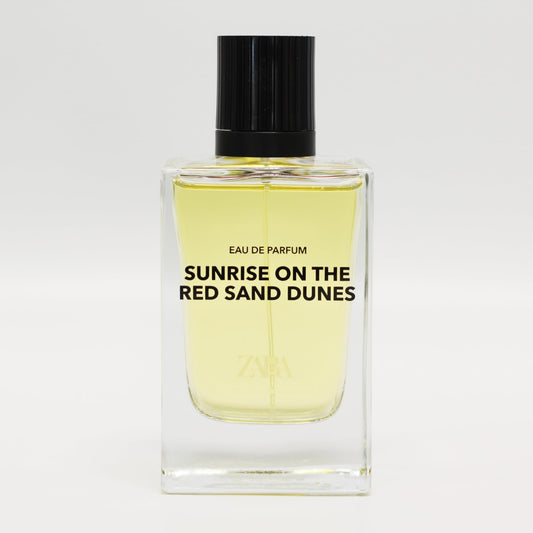 Zara Sunrise desert backdrop emphasizes energetic citrus opening