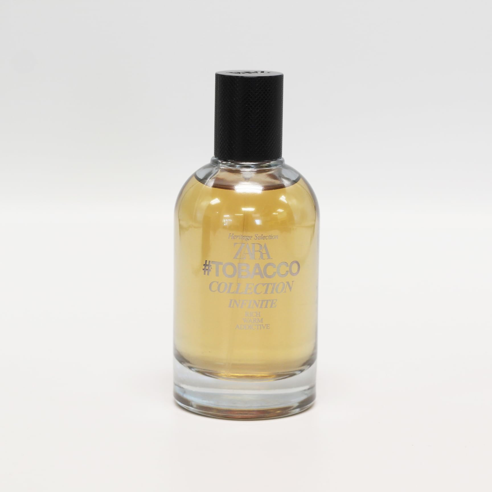 ZARA Tobacco Infinite Rich Warm EDT bottle with warm glow, everyday refinement.