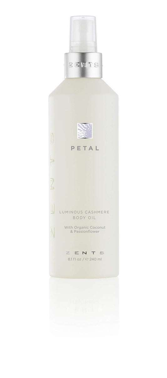 Zents Luminous Cashmere Body Oil bottle with Petal fragrance for a radiant glow.
