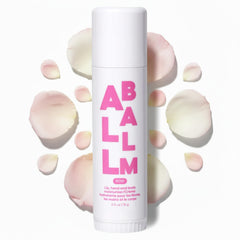 Zizia Botanicals Rose Multi All Balm Stick packaging shows compact travel size for on-the-go hydration.
