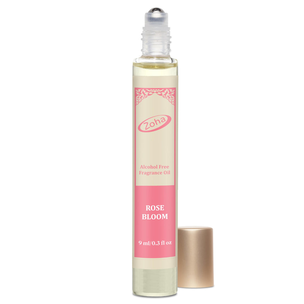 Zoha Rose Bloom roller bottle close-up, a sleek on-the-go fragrance companion.