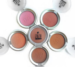 Zuzu Luxe Samba compact lid with visible warm shimmer.