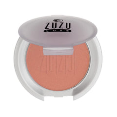 Zuzu Luxe Samba swatch on skin showing buildable bronze glow.